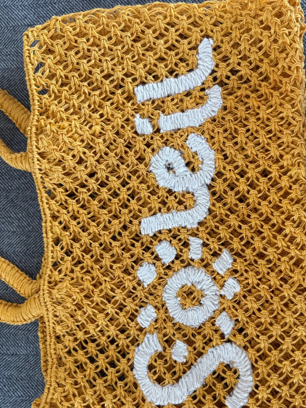 NWOT, RAFFIA WOVEN TOTE WITH DARLING “SOLEIL”